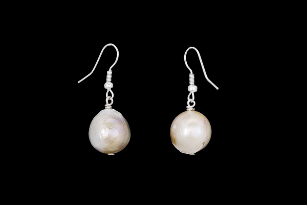 A Pair Of Large Silvered White Round Freshwater Pearls Each Suspended From A Silver Wire Hook