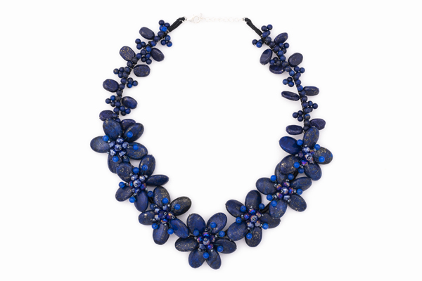 A Seven Flowers Necklace Of Lapis Lazuli Ovals And Blue Glass Plain And Facetted Small Round Beads