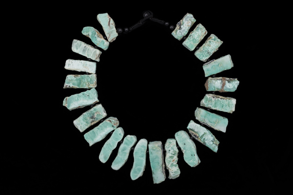 A Necklace Of Twenty-Two Chrysoprase Graduated Rectangular Drops With Black Onyx Round Spacers