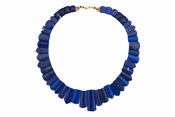 A Curved Band Necklace With Forty-Three Lapis Lazuli Curved Surface Rectangular Graduated Beads