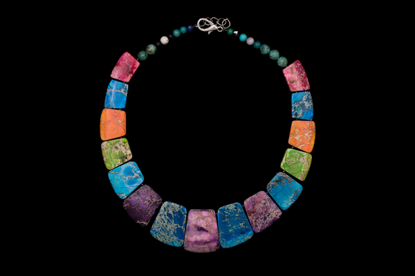 A Necklace Of Multicoloured Dyed Patterned Jasper Graduated Drops And Small Round Stone Beads