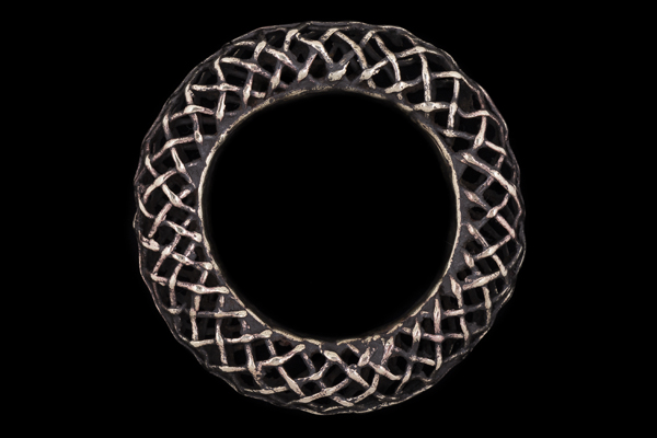 A Bamileke Traditional Tribal Hollow Brass Bangle With A Filigree Pattern Of Interlocking Bands