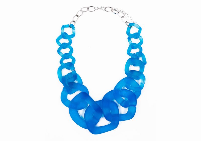 A Necklace Of Large And Graduated Sky Blue Transparent Resin Square Shaped Interlocking Loops