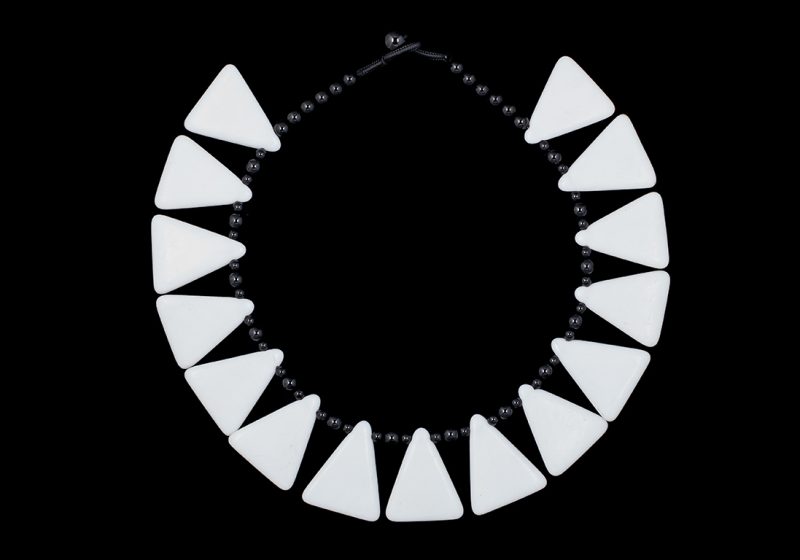 A Necklace Of Fifteen Bohemian  White Triangular Glass Drops With Black Onyx Round Spacers And Beads