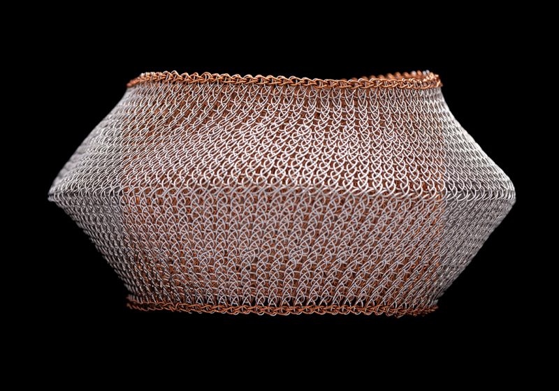 An Indonesian Bangle With A Copper Wire Mesh Inner Band And A Silvered Metal Wire Mesh Outer Band