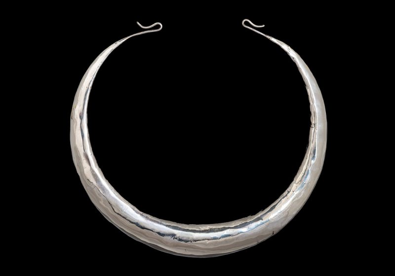 A Miao Large Silvered Metal Hollow Tapered Torque Necklace. China.