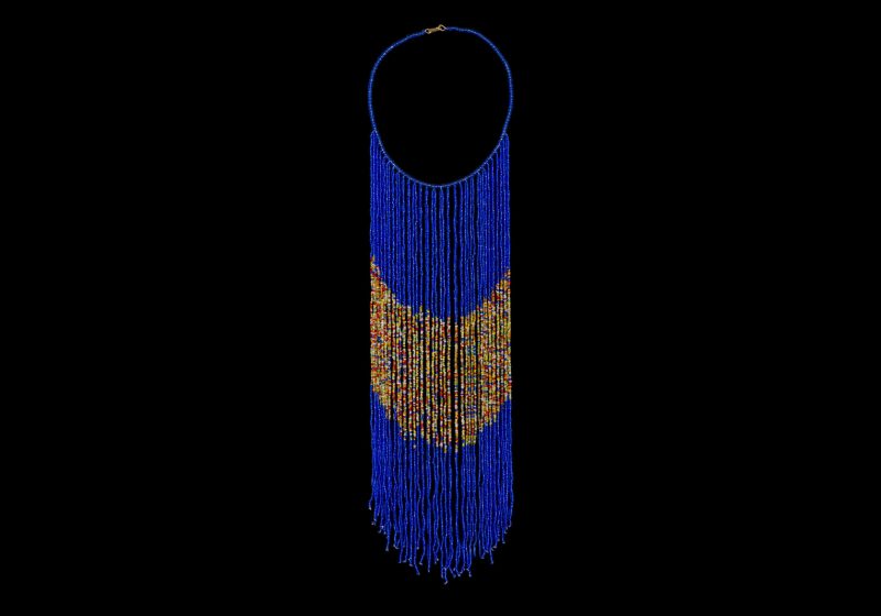 An African Yellow Resin Beads Curved Band Necklace With A Fringe Of Blue And Multicoloured Small Resin Beads