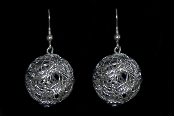 A Pair Of Silvered Metal Interlocking Wires Round Drop Earrings