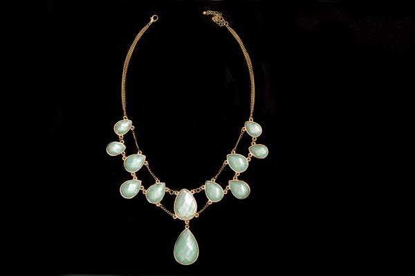 Twelve 'Aquamarine' Facetted Glass Teardrop Pendants On A Golden Metal Two Strand Chain Necklace