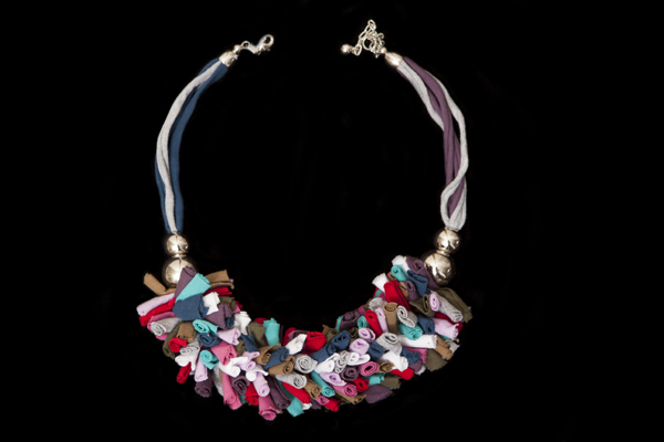 Multi-Coloured Rolled Cloth Drops And Silvered Metal Round Beads On A Multi-Coloured Cloth Necklace