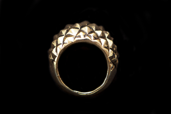 Golden Metal Pyramid Shaped Knobs On A Golden Metal Large Ring