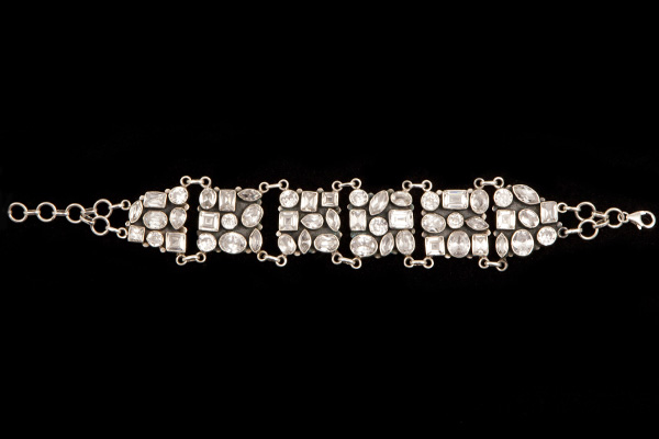 Cubic Zirconia Mixed Shaped Facetted Cabochons Set Into A Six Linked Panels Silver Bracelet