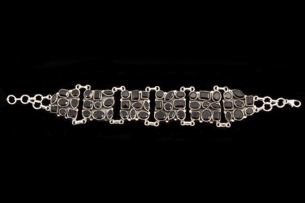 Black Spinel Facetted Cabochons, Set Into A Seven Linked Panels Silver Bracelet