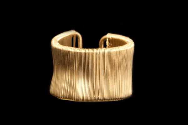 Golden Metal Parallel Wires Attached To A Golden Metal Open Banded Ring