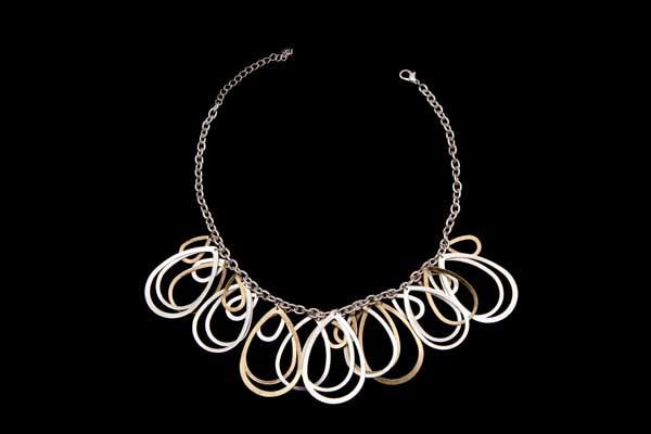 Silvered And Golden Metal Large And Small Teardrop Pendants On A Silvered Metal Chain Links Necklace