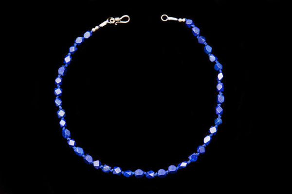 Lapis Lazuli Small Four Sided Diamond Patterned Facetted Beads On A Blue Cotton Knotted Necklace