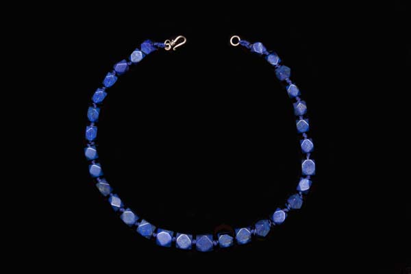 Lapis Lazuli Four Sided Facetted Beads On A Blue Cotton Knotted Necklace