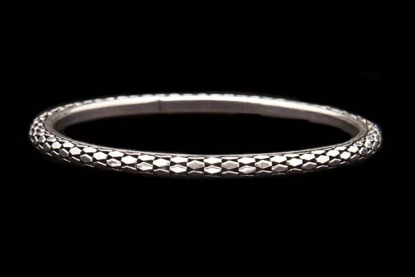 Silvered Metal Narrow Bangle, Decorated With A Filigree Pattern Of Raised Facetted Flat Ovals