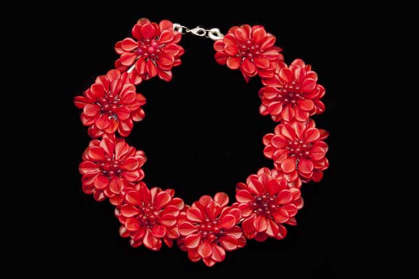Nine Red Glass Multi-Petalled Flowers On A Silvered Metal Circular Band Necklace