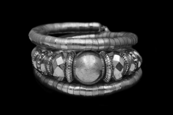 Silvered Metal Coiled Flexible Three Bands Bracelet Decorated With Mixed Shaped And Sized Beads