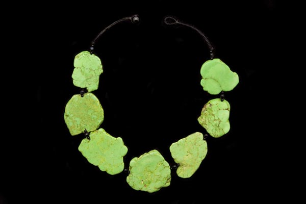 A Necklace Of Seven Light Green Dyed Magnesite Large Flat Irregular Slices, With Black Onyx Spacers