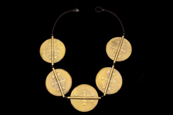 A Necklace Of Five Baule Tribe Large Circular Patterned Brass Discs. Ivory Coast, West Africa