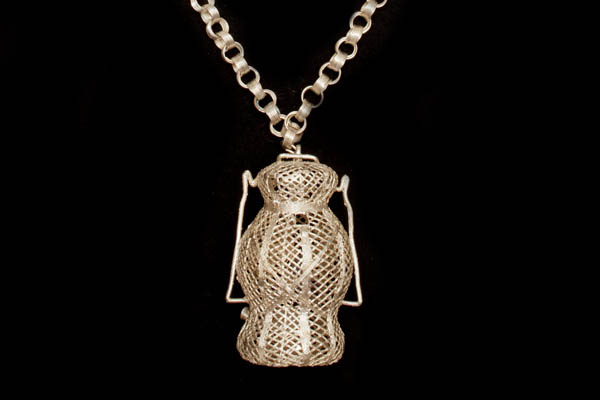 An Akan Silvered Metal Long 'Chain Of Office' Necklace With A Filigree Bottle Pendant. Ghana