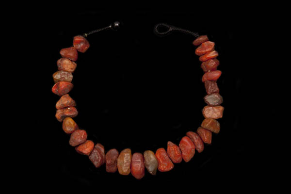 A Necklace Of Madagascar Cornelian Rough Nuggets With Black Agate Small Round Spacers