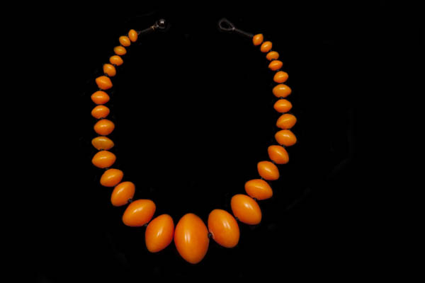 Orange Amber Resin Graduated Circular Ridged Beads Knotted Necklace