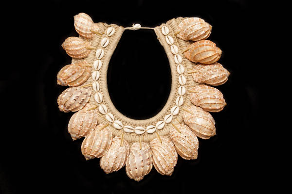 An Indonesian Large Cream Braided Rope Necklace, Decorated With Brown Curved Ribbed Shells