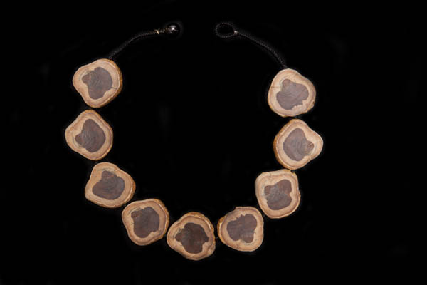 A Knotted Necklace Of Light And Dark Brown Large Fossilised Cherrywood Slices