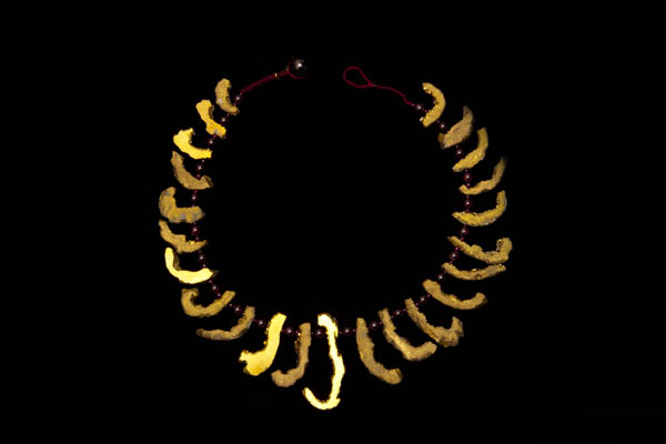 A Necklace Of Peruvian Pyrites Graduated Curled Sliced Drops, With Garnet Round Spacers