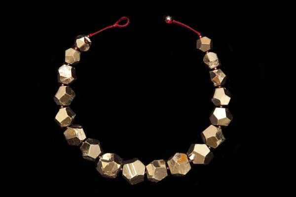 A Necklace Of Peruvian Pyrites Large Graduated Facetted Nuggets With Garnet Small Round Spacers