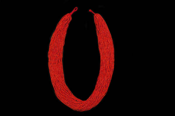 A Mali Long Necklace Of Fifty Strands Of Small Red Glass Beads