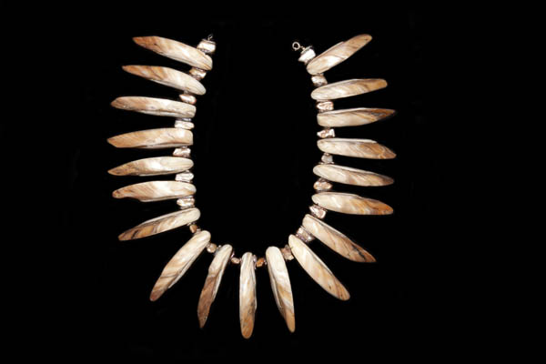 A Necklace Of Nineteen Large Curved Mother-Of-Pearl Shells Drops With Small Flat Shell Spacers