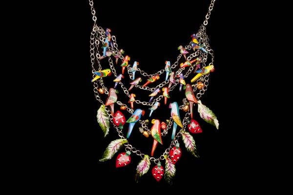 A Silvered Metal Five Chains Necklace Decorated With Hand Painted Wood Parrots, Strawberries And Leaves
