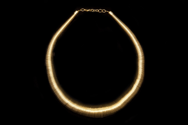 A Golden Metal Necklace Of Thin Graduated Circular Coiled Bands