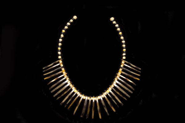 A Necklace Of Light Brown And Black Buffalo Horn Small Beads With Thirty Light Brown Pointed Oval Thin Drops