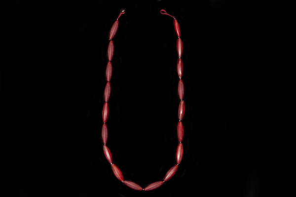 A Long Necklace Of Eighteen Antique Bohemian Long Red Facetted Oval Beads With Garnet Round Spacers