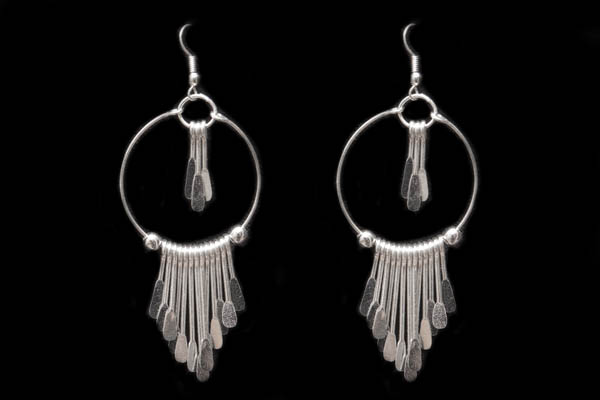 A Pair Of Silvered Metal Hoop Earrings With Sixteen Spoon Drop Pendants