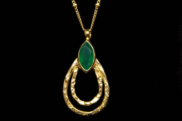A Gold Plated Chain Necklace With A Double Loop Teardrop Decorated With A Green Onyx Facetted Cabochon