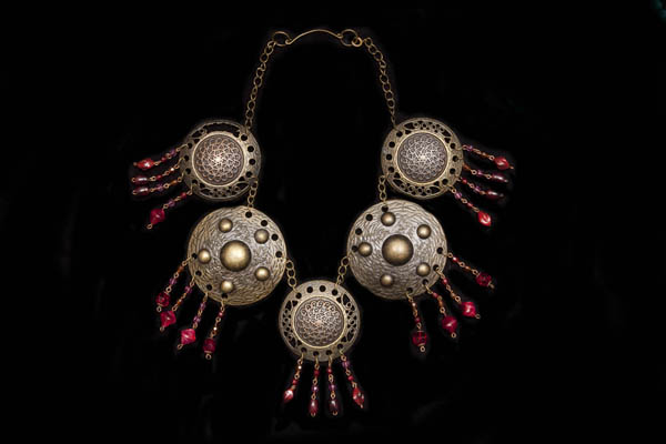 A Turkish Dark Golden Metal Chain Necklace Decorated With Five Patterned Circular Discs And Pendants