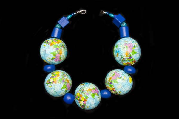 A Large Necklace Of Five Rubber World Globes With Dark Blue Painted Wood Spacers And Beads