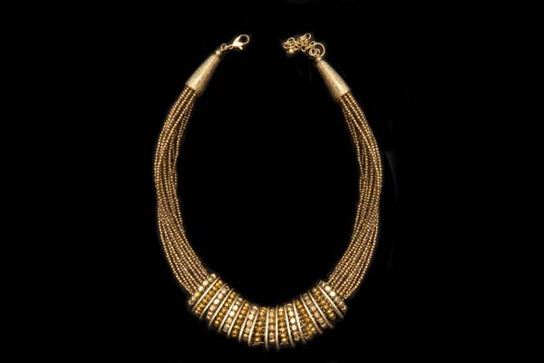 A Multistrand Necklace Of Dark Golden Metal Small Beads Decorated With Rings Of Facetted Small Beads