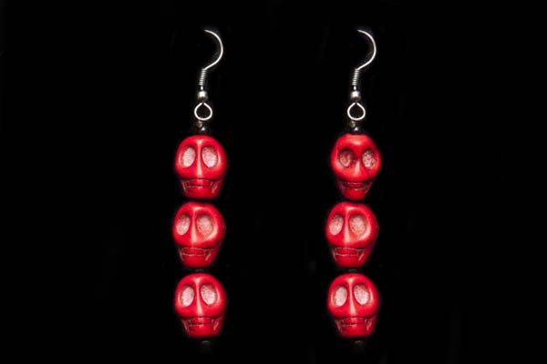 A Pair Of Red Dyed Howlite Three Skull Beads Drop Earrings With Black Onyx Small Round Spacers