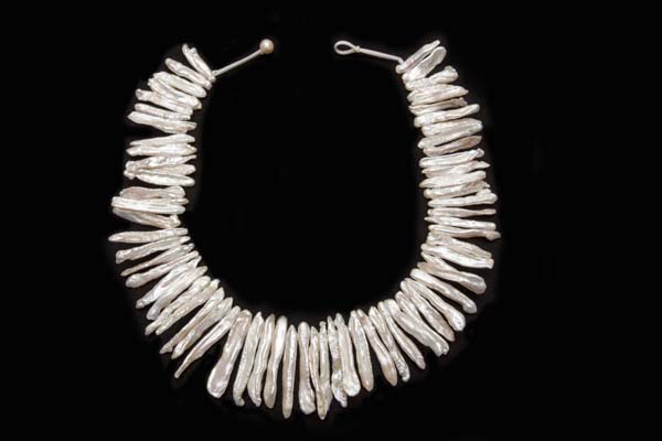 A Necklace Of Sixty-Eight Graduated White Freshwater Pearls Long Narrow Drops