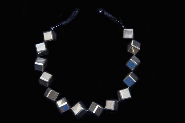 A Necklace Of Fourteen Peruvian Pyrites Facetted Cubed Beads With Black Onyx Small Round Spacers