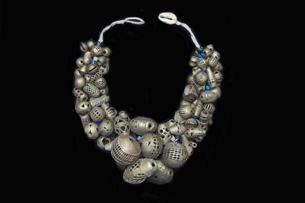 An African Necklace Of Baule Tribal Brass Patterned Bunched Beads Of Different Shapes And Sizes