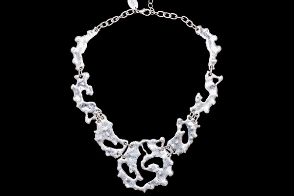 A Necklace Of Irregular Shaped Silvered Metal Flat Graduated Linked Beads On A Chain Links Necklace