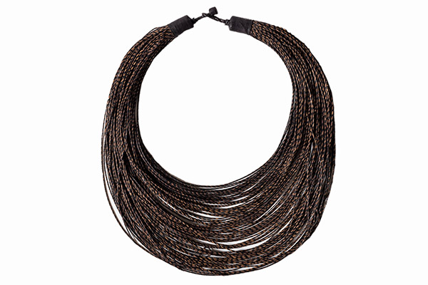 A Long Necklace Of Ninety-Eight Light And Dark Brown Braided Leather Graduated Bands